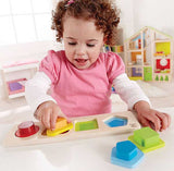 Child with First Puzzle Shapes