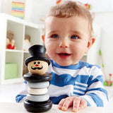 baby with magician baby rattle