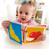 Baby with first baby book