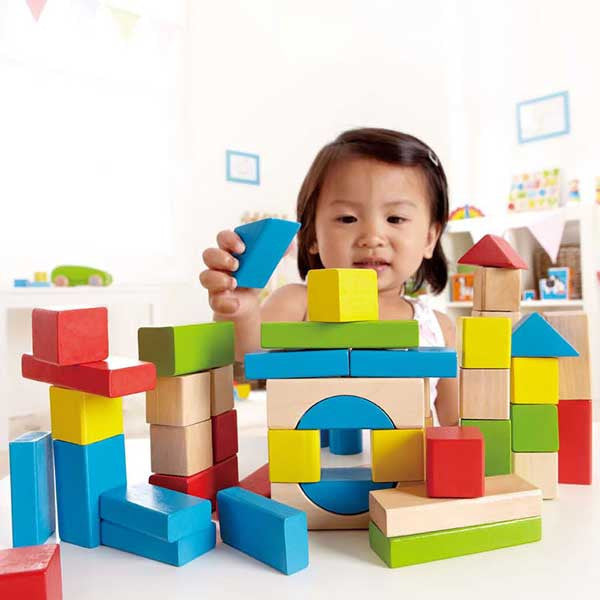 Child with Colored Maple Building Blocks